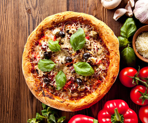 Fresh italian pizza on wood