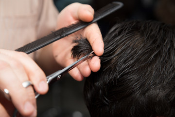 Men's haircut scissors at salon