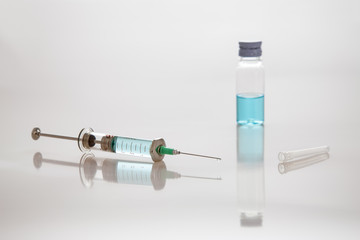 syringe with needle and vial