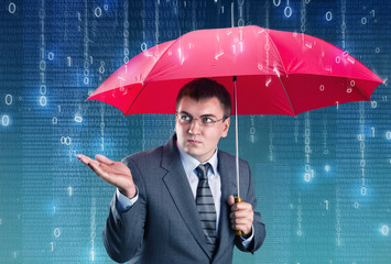 Office worker hiding under an umbrella from digital rain