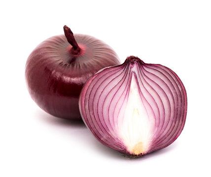 Two ripe onions on a white background