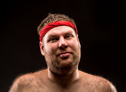 Man With Red Headband Looking At Camera