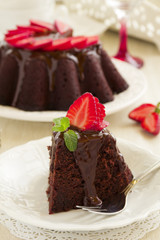 Fototapeta na wymiar Chocolate cake with strawberries.