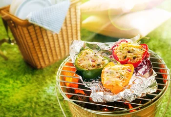 Foto op Canvas Stuffed savory sweet peppers grilling on foil © exclusive-design