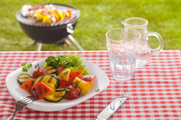 Serving of roast vegetables on a summer picnic