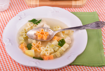 Stars shaped pasta soup