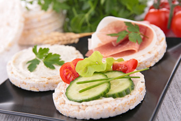canape with rice cake and cucumber