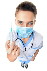 Young doctor with syringe