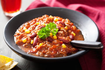 mexican chili con carne in black plate