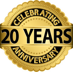 Celebrating 20 years anniversary golden label with ribbon, vecto