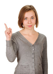 young woman shows sign and symbol on white background