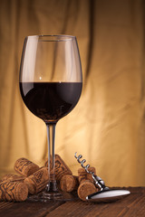 corkscrew   and wine glass