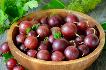 Gooseberries in wooden bowl