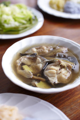 fish soup with ginger in natural light
