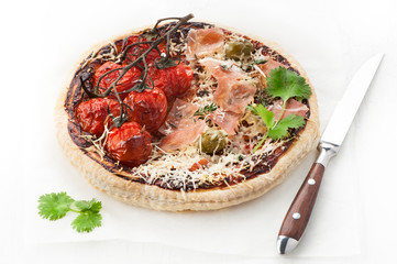 Pizza prosciutto ham, cherry tomatoes, parmesan cheese