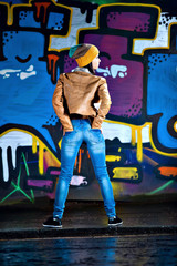 Pretty young girl and graffiti