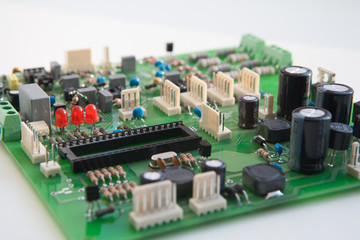 Electric charge, chips. Green electronic circuit.