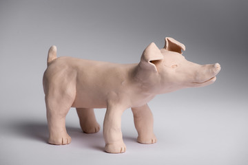 clay sculpture of a dog.