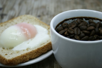 soft-boiled egg and a cup of coffee