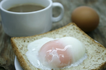 soft-boiled egg and a cup of coffee
