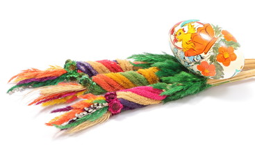Easter painted egg and palm on white background