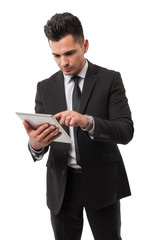 Businessman checking data in his ipad