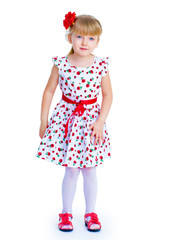 beautiful little girl with a smile jumping