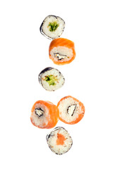 Fototapeta premium Falling sushi maki rolls