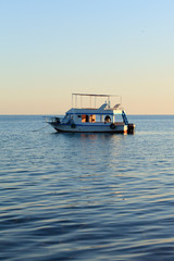 Naklejka premium catamaran on blue sea