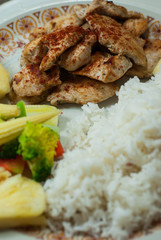 Grilled chicken with rice and vegetables
