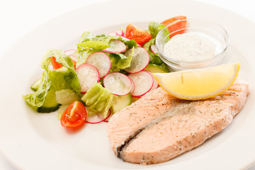 salmon steak with salad