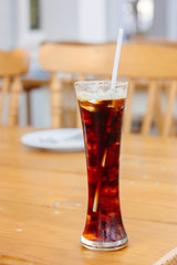 Espresso Ice cube on wood table