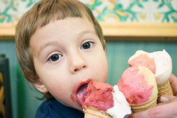 boy eating too much ice-cream