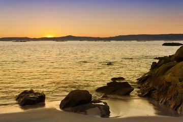 Rocks, beach and sea on Arousa Island