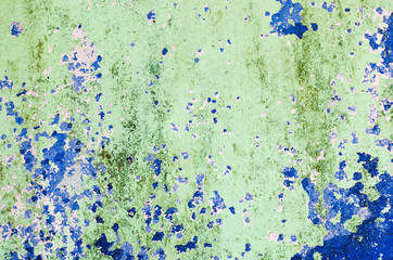 Dirty green paint cement wall closeup for background