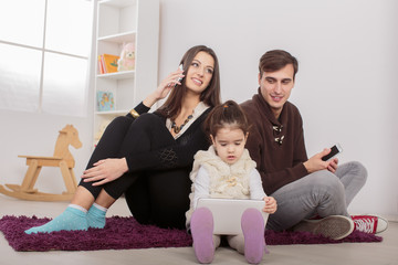 Happy family sitting in the room