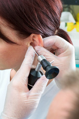 Patient having an ear exam