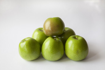 Green apples  group on a white background