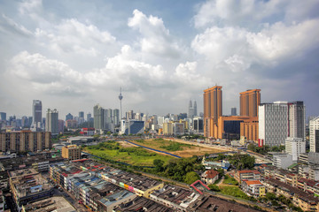 Kuala Lumpur Cityscape with Dramatic Clouds and Sky