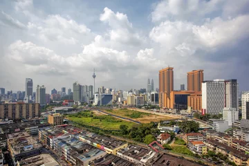 Foto auf Leinwand Kuala Lumpur Cityscape mit dramatischen Wolken und Himmel © jpldesigns