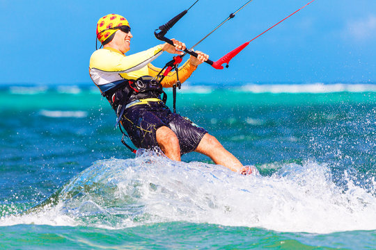 young  kitesurfer on sea background Extreme Sport Kitesur
