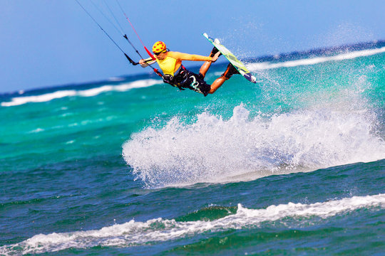 jumping kitesurfer on sea background Extreme Sport Kitesurfing