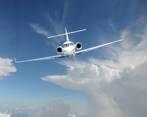 Private jet airplane in the sky - 62283277