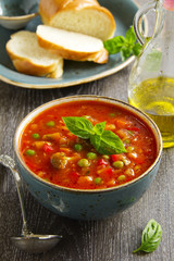 Bowl of minestrone soup with bread