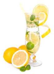Glass of cocktail with lemon and mint isolated on white