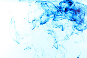 Ink in water on blue background