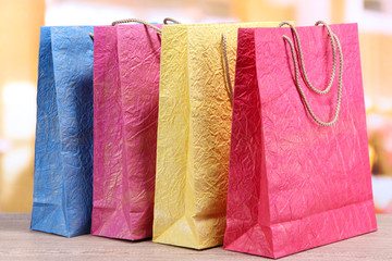 Colorful shopping bags, on  bright background