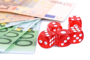 Red dices and money, isolated on white