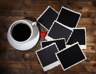 Composition with coffee cup, decorative hearts and old blank