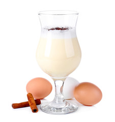 Eggnog with spices isolated on white